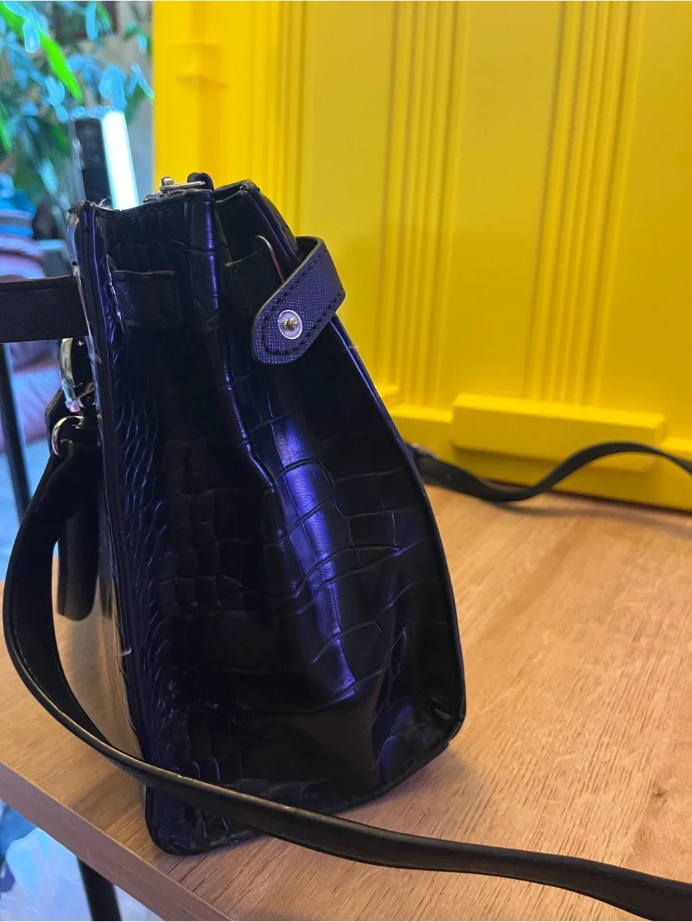 Guess Black Embossed Satchel Bag in good condition except missing one button